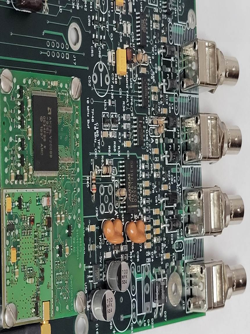 A close-up of a circuit board
Description automatically generated